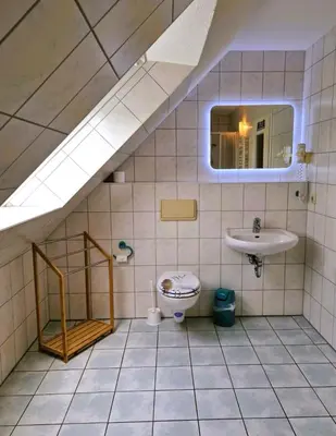 Ein Badezimmer in der Unterkunft Strandstr.41 Fewo 1