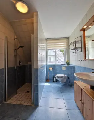 Ein Badezimmer in der Unterkunft Strandstr.41 Fewo 1