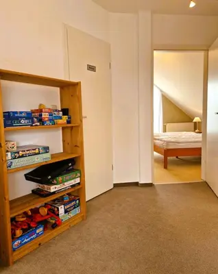 Ein Bett oder Betten in einem Zimmer der Unterkunft Strandstr.41 Fewo 2