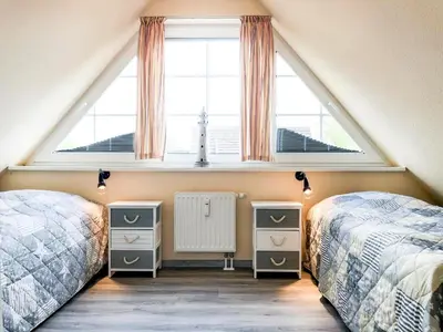 Ein Bett oder Betten in einem Zimmer der Unterkunft Ostseeauszeit