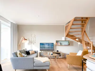 Ein Sitzbereich in der Unterkunft Beach Loft