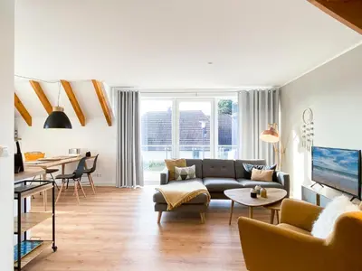 Ein Sitzbereich in der Unterkunft Beach Loft