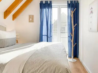 Ein Bett oder Betten in einem Zimmer der Unterkunft Beach Loft