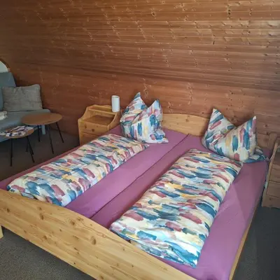 Ein Bett oder Betten in einem Zimmer der Unterkunft Kuhn