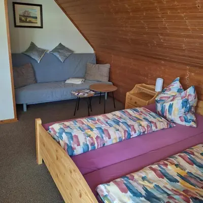 Ein Bett oder Betten in einem Zimmer der Unterkunft Kuhn