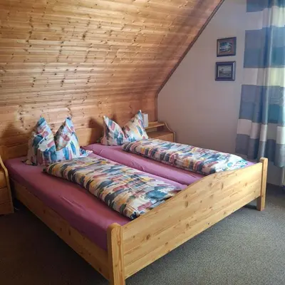 Ein Bett oder Betten in einem Zimmer der Unterkunft Kuhn