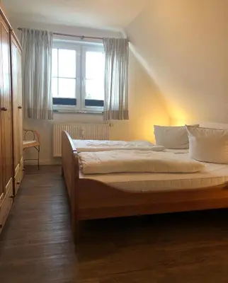 Ein Bett oder Betten in einem Zimmer der Unterkunft Strandstr.51 Wohnungsnr.11