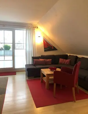 Ein Sitzbereich in der Unterkunft Strandstr.51 Wohnungsnr.11
