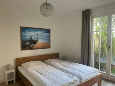 Ein Bett oder Betten in einem Zimmer der Unterkunft Bickbeeren FeWo BICKBEEREN Amalia Whg. 1