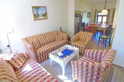Ein Sitzbereich in der Unterkunft Ferienhaussiedlung Strandperlen Küstenhof 5a (Typ X)