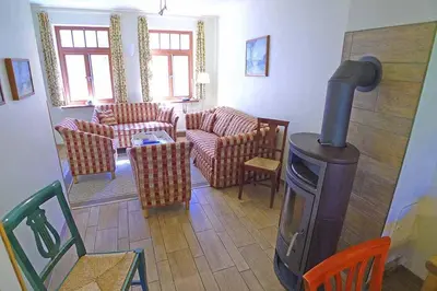 Ein Sitzbereich in der Unterkunft Ferienhaussiedlung Strandperlen Küstenhof 5a (Typ X)