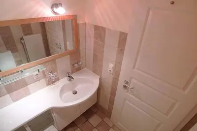 Ein Badezimmer in der Unterkunft Ferienhaussiedlung Strandperlen Küstenhof 5a (Typ X)