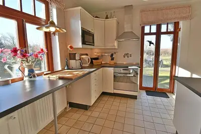 Küche/Küchenzeile in der Unterkunft Ferienhaussiedlung Strandperlen Küstenhof 5b (Typ X)