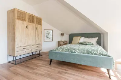 Ein Bett oder Betten in einem Zimmer der Unterkunft TURMHAUS Whg. TH-15