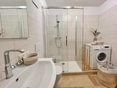 Ein Badezimmer in der Unterkunft TURMHAUS Whg. TH-15