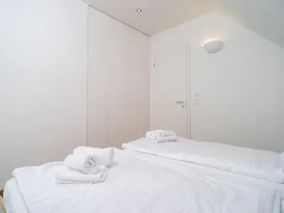 Ein Bett oder Betten in einem Zimmer der Unterkunft Haus SEEGARTEN