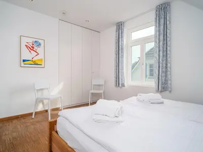 Ein Bett oder Betten in einem Zimmer der Unterkunft Haus SEEGARTEN