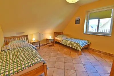 Ein Bett oder Betten in einem Zimmer der Unterkunft Haus EMMA WF-03 rechte Haushälfte