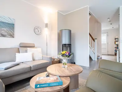 Ein Sitzbereich in der Unterkunft Haus STRANDLUST WF-04