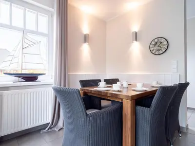 Ein Sitzbereich in der Unterkunft Haus STRANDLUST WF-05