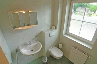 Ein Badezimmer in der Unterkunft Ferienhaus An der alten Waldschänke WS-11a