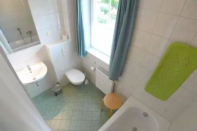 Ein Badezimmer in der Unterkunft Ferienhaus das Blaue Haus WS-9a