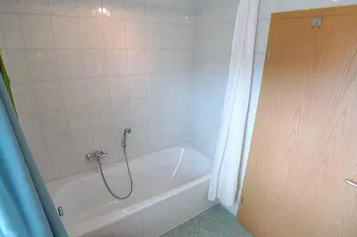 Ein Badezimmer in der Unterkunft Ferienhaus das Blaue Haus WS-9a