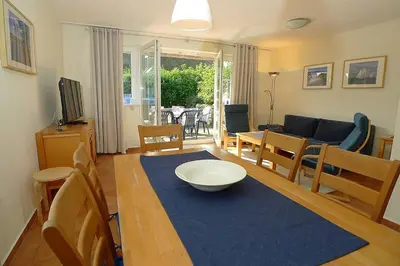 Ein Sitzbereich in der Unterkunft Ferienhaus das Blaue Haus WS-9a