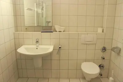 Ein Badezimmer in der Unterkunft *Strandaster* in Zingst - 100 m bis Strand, ruhig, zentral.