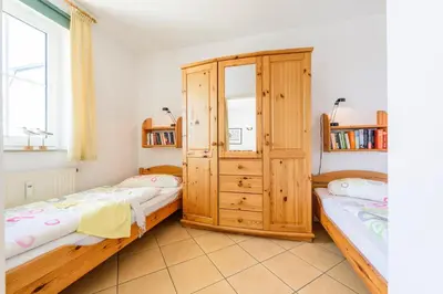 Ein Bett oder Betten in einem Zimmer der Unterkunft Strandstr.51 Wohnungsnr.2