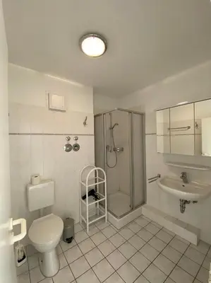 Ein Badezimmer in der Unterkunft Strandstr.51 Wohnungsnr.3