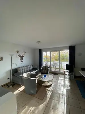 Ein Sitzbereich in der Unterkunft Strandstr.51 Wohnungsnr.3