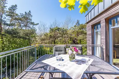 Ein Balkon oder eine Terrasse in der Unterkunft FeWo AN DER DÜNE DG-Whg. D46.2