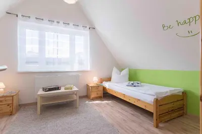 Ein Bett oder Betten in einem Zimmer der Unterkunft Haus DE LOOP