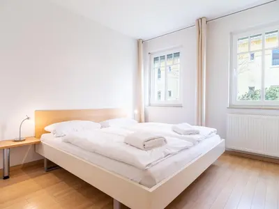 Ein Bett oder Betten in einem Zimmer der Unterkunft Grüne Straße FeWo G2 (EG rechts)