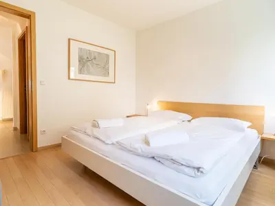 Ein Bett oder Betten in einem Zimmer der Unterkunft Grüne Straße FeWo G2 (EG rechts)