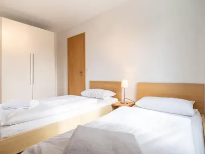 Ein Bett oder Betten in einem Zimmer der Unterkunft Grüne Straße FeWo G2 (EG rechts)
