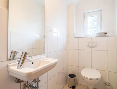Ein Badezimmer in der Unterkunft Grüne Straße FeWo G8 (DG rechts)