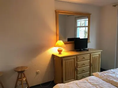 Ein Bett oder Betten in einem Zimmer der Unterkunft Stromstr.2 