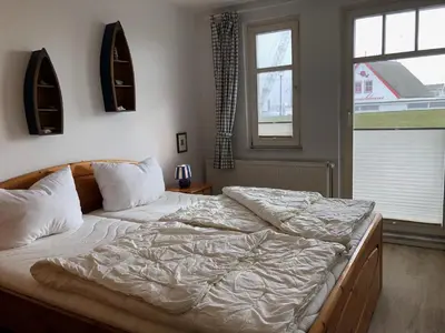 Ein Bett oder Betten in einem Zimmer der Unterkunft Stromstrasse 2 Whg.7