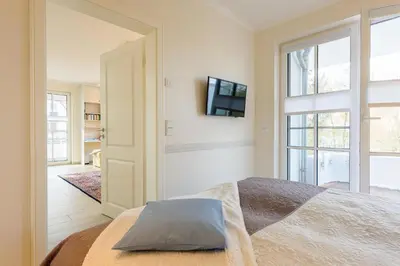 Ein Bett oder Betten in einem Zimmer der Unterkunft Viktoria Luna WE 3 
