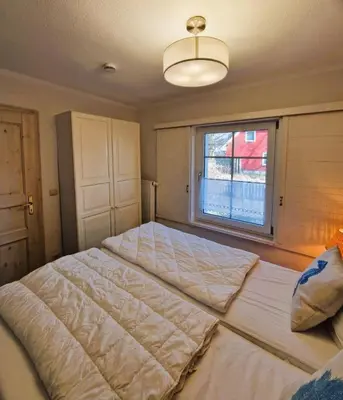 Ein Bett oder Betten in einem Zimmer der Unterkunft Wiesenstr. FeWo Werder