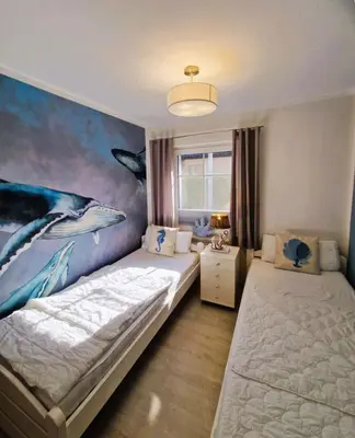 Ein Bett oder Betten in einem Zimmer der Unterkunft Wiesenstr. FeWo Werder