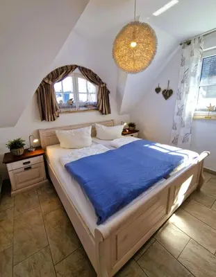 Ein Bett oder Betten in einem Zimmer der Unterkunft Wiesenstr.78 