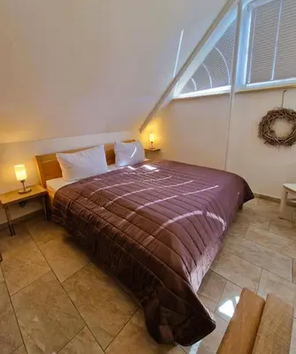 Ein Bett oder Betten in einem Zimmer der Unterkunft Wiesenstr.78 
