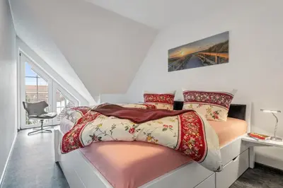 Ein Bett oder Betten in einem Zimmer der Unterkunft Birkenstr. 21 B Wohnung 17