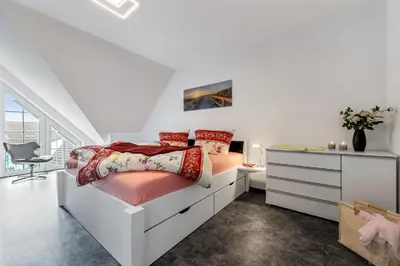 Ein Bett oder Betten in einem Zimmer der Unterkunft Birkenstr. 21 B Wohnung 17
