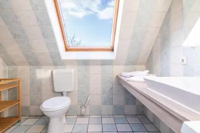 Ein Badezimmer in der Unterkunft Ferienhaussiedlung Strandperlen Buchenhof 2a (Typ VIII)