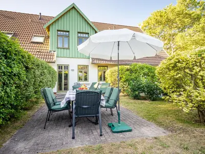 Ein Garten an der Unterkunft Ferienhaussiedlung Strandperlen Buchenhof 2b (Typ VI)