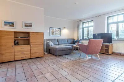 Ein Sitzbereich in der Unterkunft Ferienhaussiedlung Strandperlen Buchenhof 2b (Typ VI)